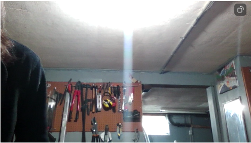 Vertical beam intersecting light bulb